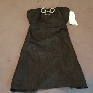Black, strapless, necklace dress.
